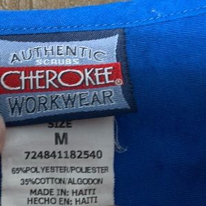 Cherokee Scrubs. Stain free, smoke free, camera just makes them look discolored